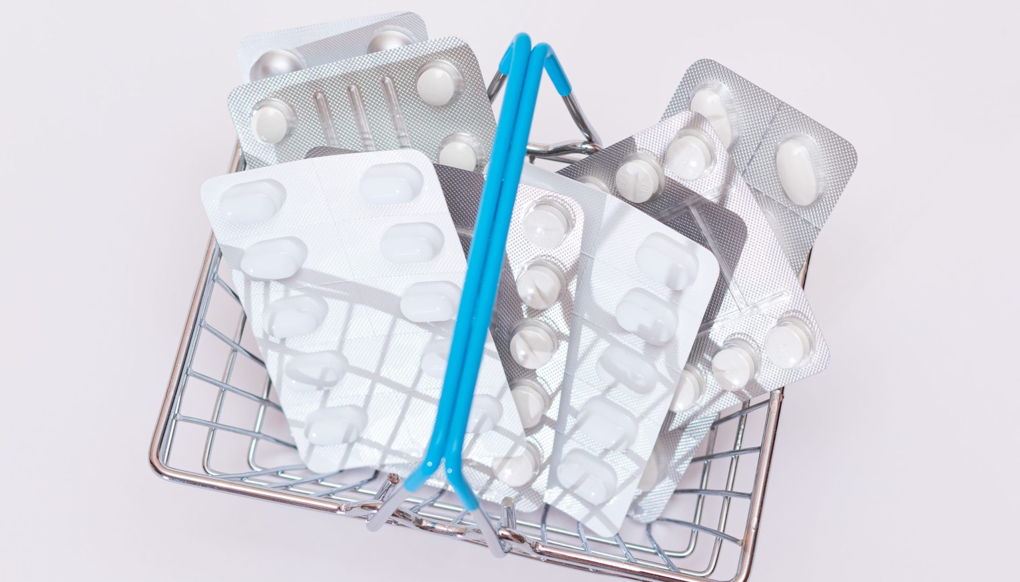Buying Medicines. Expensive Medicine and Inflation Concept: Pills and Capsules in Shopping Basket. Global Pharmaceutical Industry and Big Pharma. Ordering Pharmaceutical Product